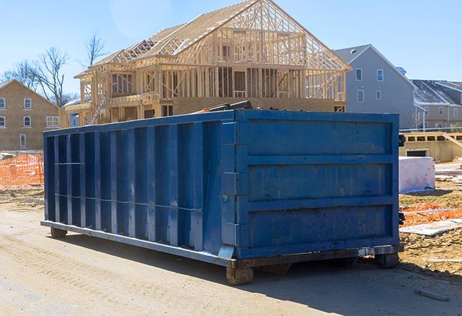 waste management at its best - residential dumpsters in use